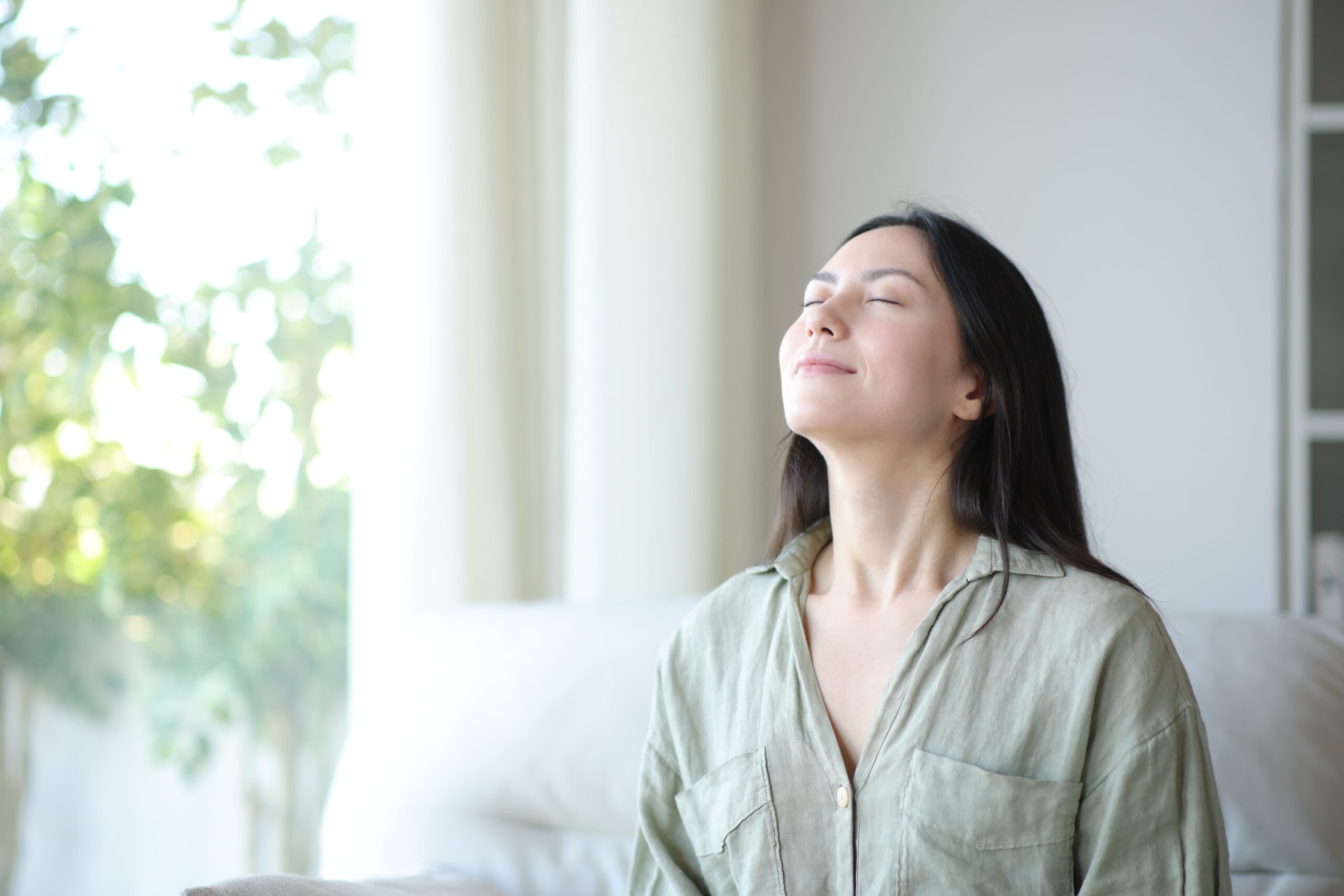 individual in recovery practicing breathwork for stress relief