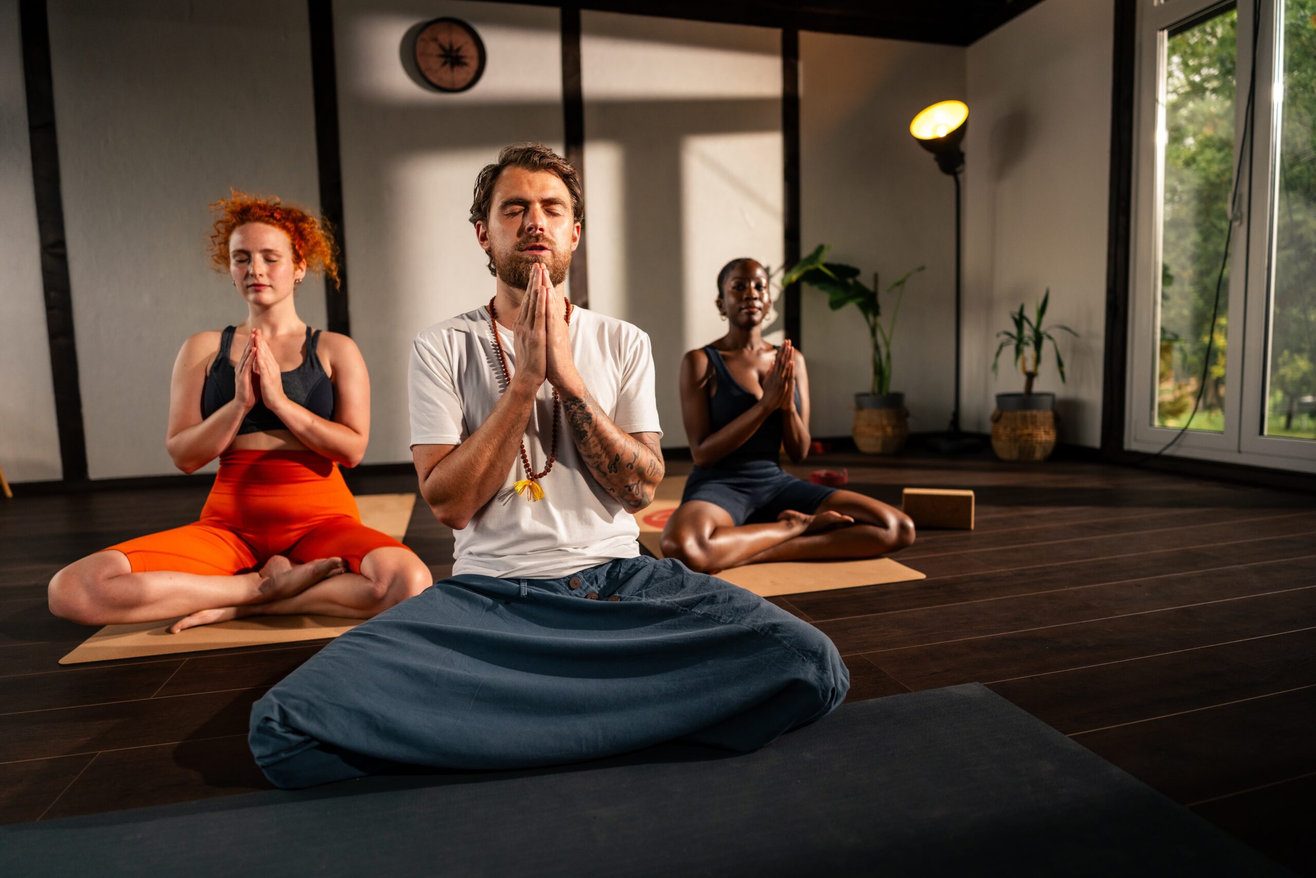 recovery group engaging in mindful breathwork exercises