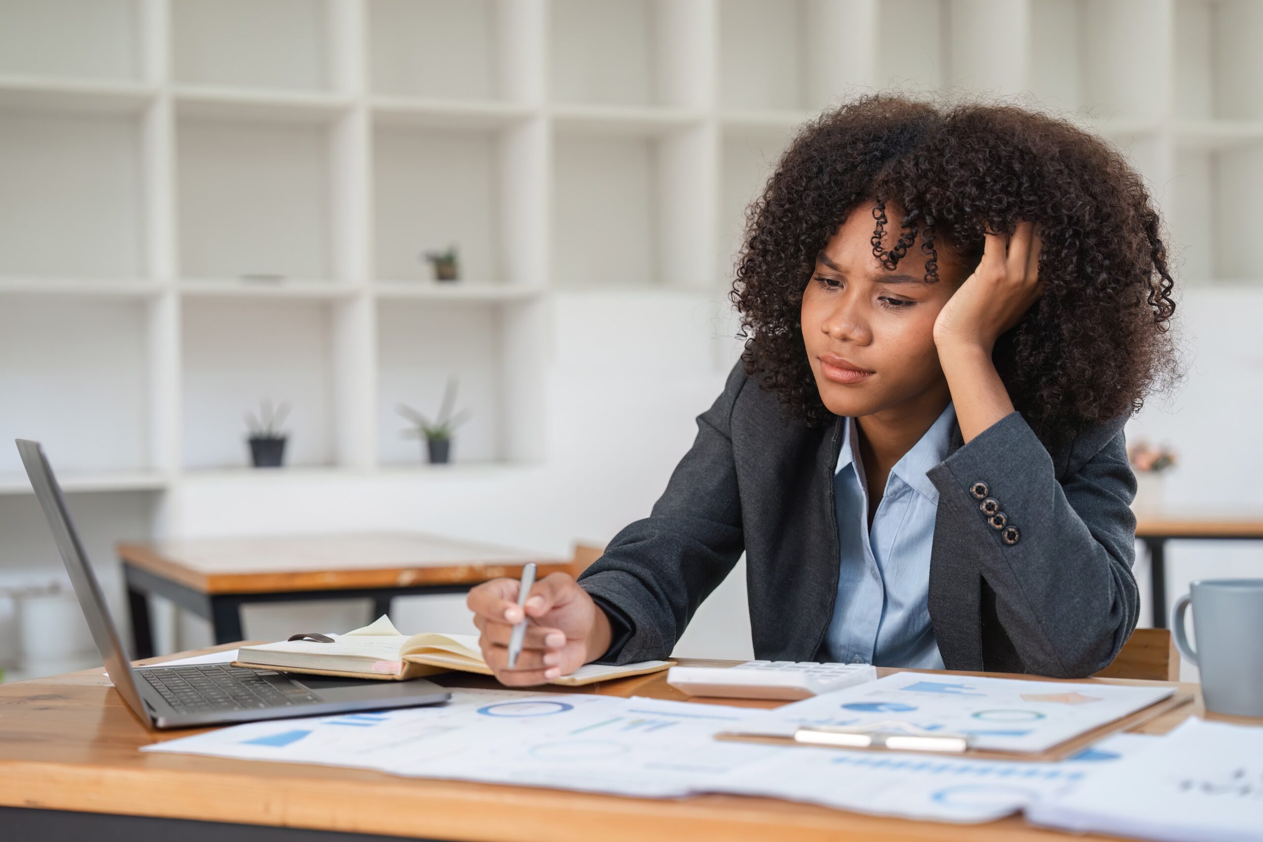 Employee showing how getting bored at work affects mental health