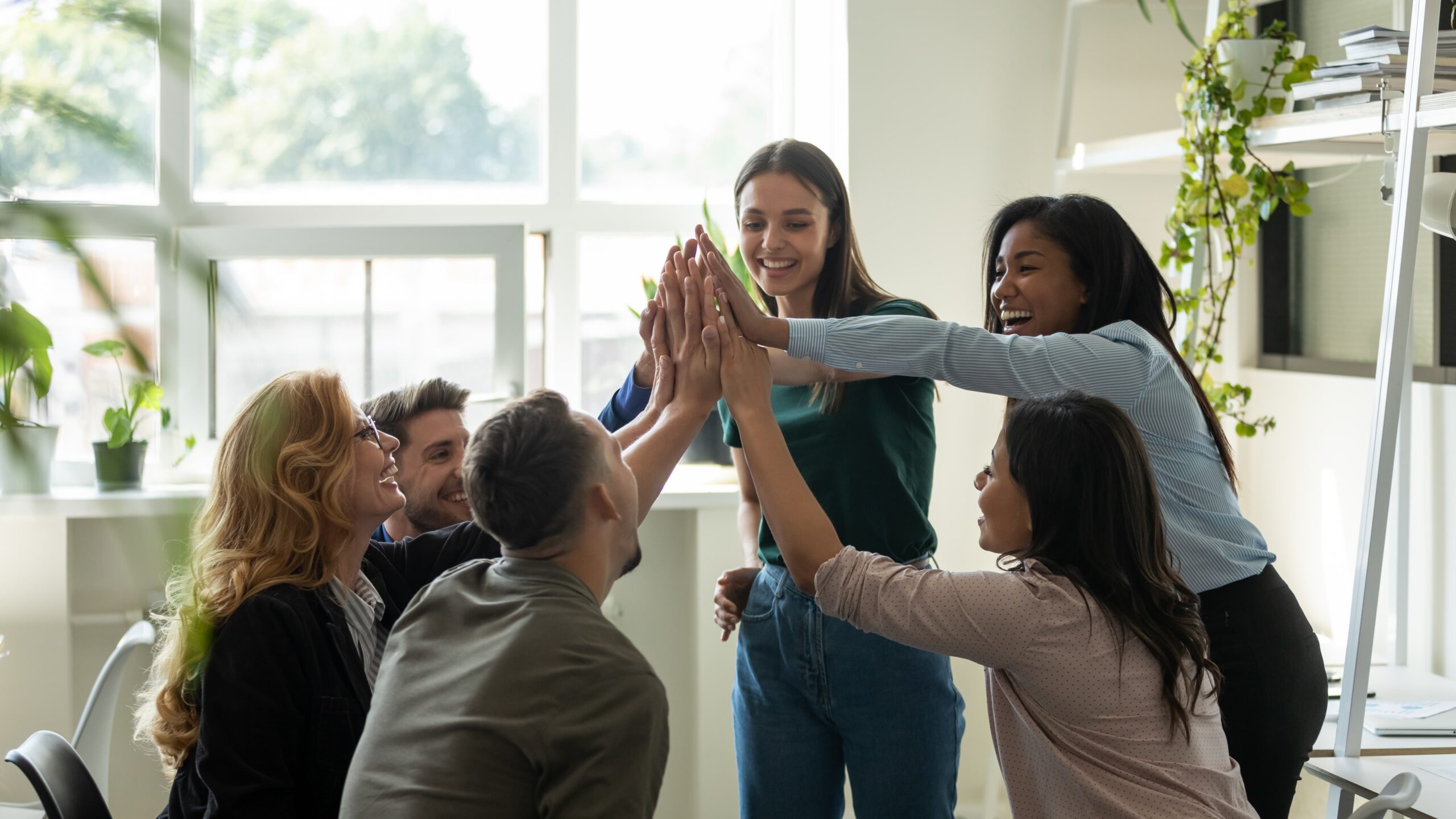 People celebrating recovery milestones as they follow steps to start recovery